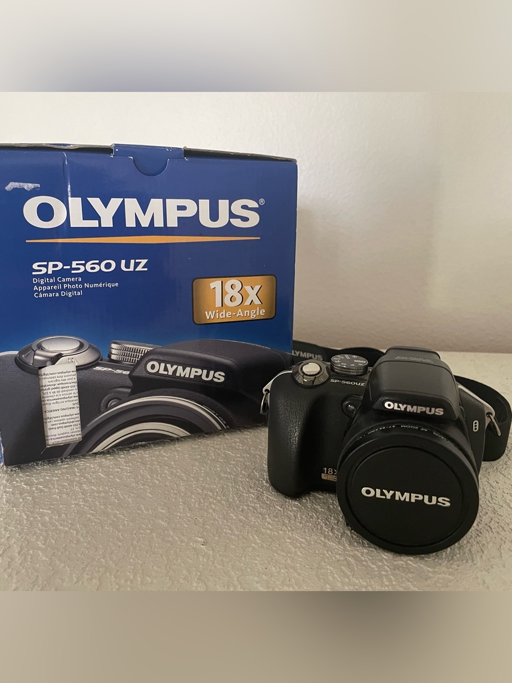 Olympus Stylus SP-560UZ 18x Zoom Digital Bridge Camera 8.0MP In Box